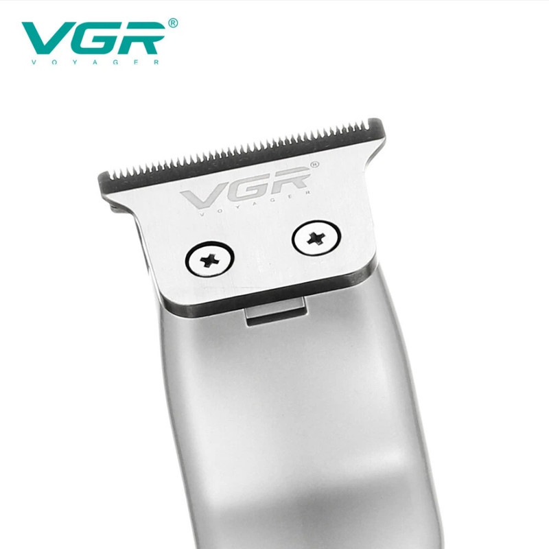 ماشین اصلاح موی صورت و بدن وی جی ار مدل V_290 با تیغه کروم و تیتانیوم خودتیز شونده، باتری لیتیوم یونی شارژی با 120 دقیقه استفاده، قابلیت تنظیم سرعت و وزن 120 گرم
