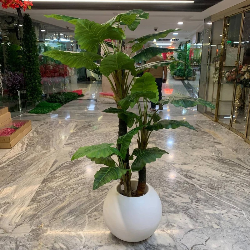درختچه مصنوعی بابا آدم با برگ قابل شستشو، 3 تنه، ابعاد 20x20x180 سانتی‌متر، وزن 15000 گرم، مناسب فضای باز و گل‌های آپارتمانی، بدون گلدان