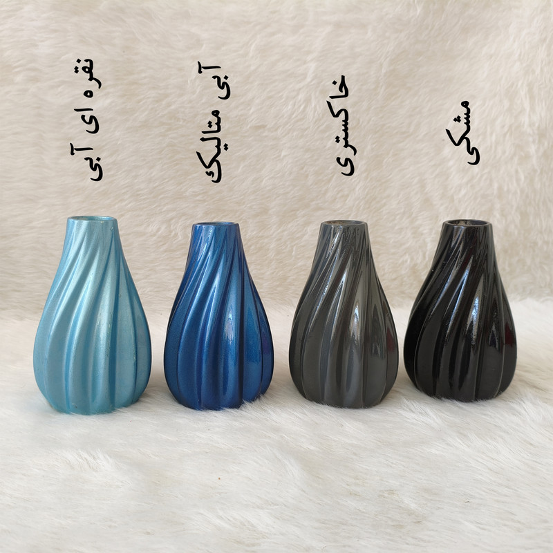 گلدان دکوری رومیزی مدل پیچک مناسب گل‌های آپارتمانی با ابعاد 15x8x8 سانتی‌متر و پوشش براق محافظ و طراحی موج‌دار زیبا