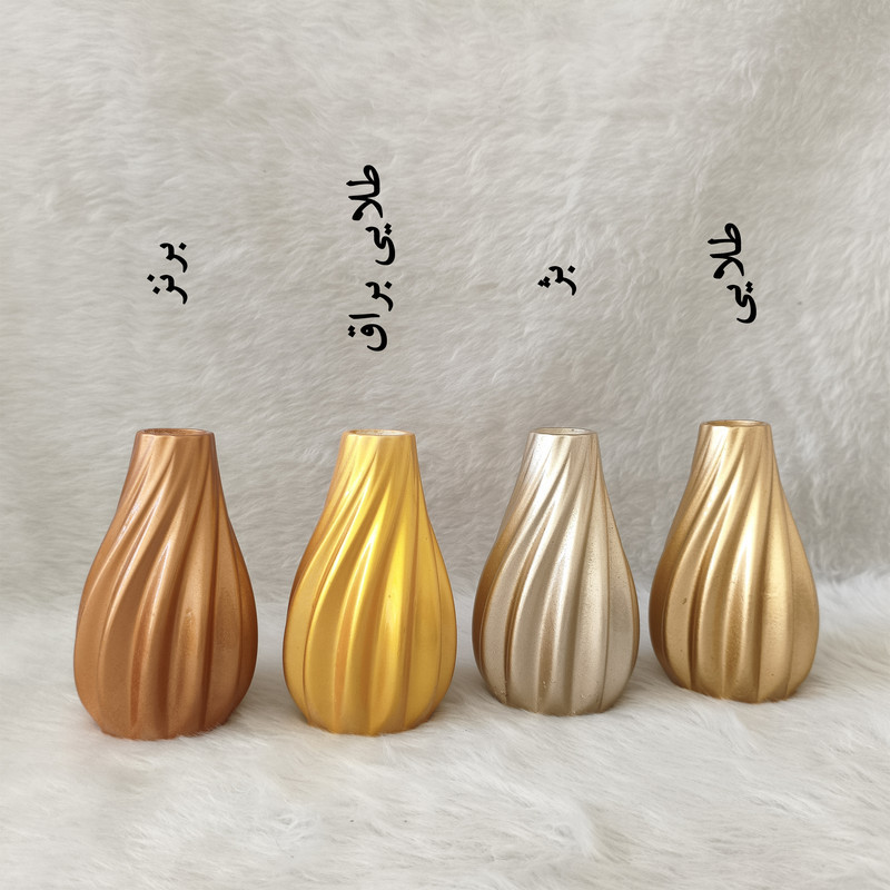 گلدان دکوری رومیزی مدل پیچک مناسب گل‌های آپارتمانی با ابعاد 15x8x8 سانتی‌متر و پوشش براق محافظ و طراحی موج‌دار زیبا