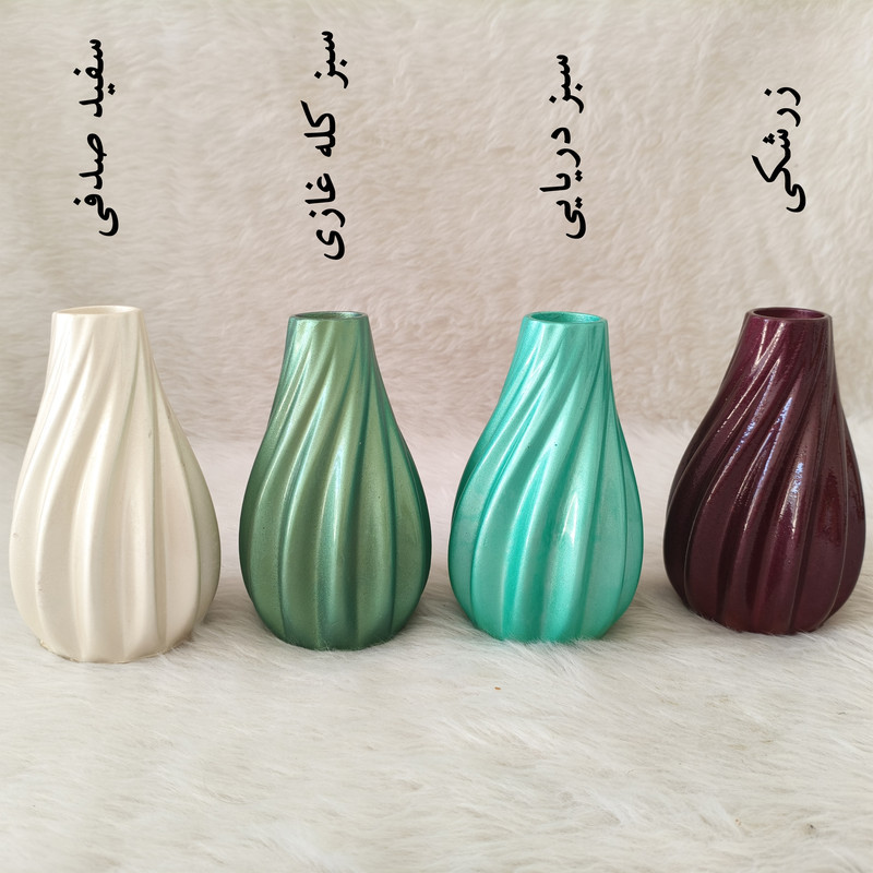 گلدان دکوری رومیزی مدل پیچک مناسب گل‌های آپارتمانی با ابعاد 15x8x8 سانتی‌متر و پوشش براق محافظ و طراحی موج‌دار زیبا
